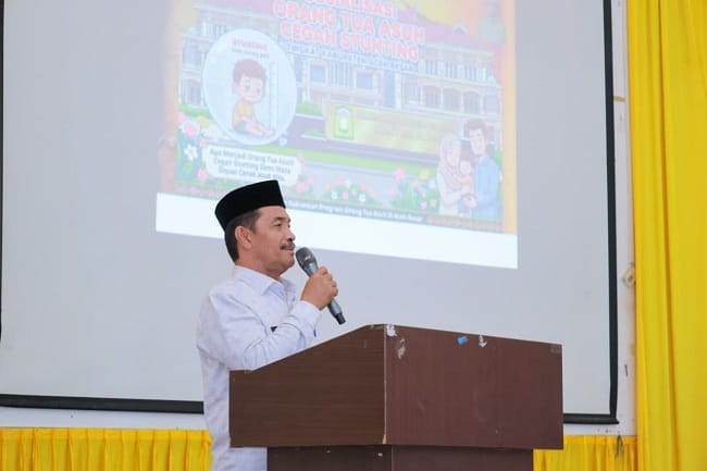Wakil Bupati Aceh Besar Drs H Syukri membuka Sosialisasi Orang Tua Asuh Cegah Stunting di Aula SMK Mubarkeya, Kamis (25/6/2026).
