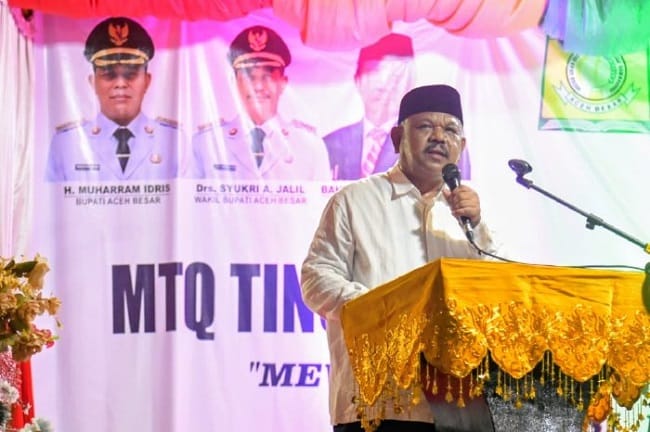 whatsapp_image_2026-06-13_at_1044191 Kadis Syariat Islam Aceh Besar, Rusdi S.Sos., M.Si. sampaikan sambutan sekaligus membuka MTQ Kecamatan Kuta Baro, Aceh Besar, Jumat (12/06/2026) malam. FOTO/MC ACEH BESAR