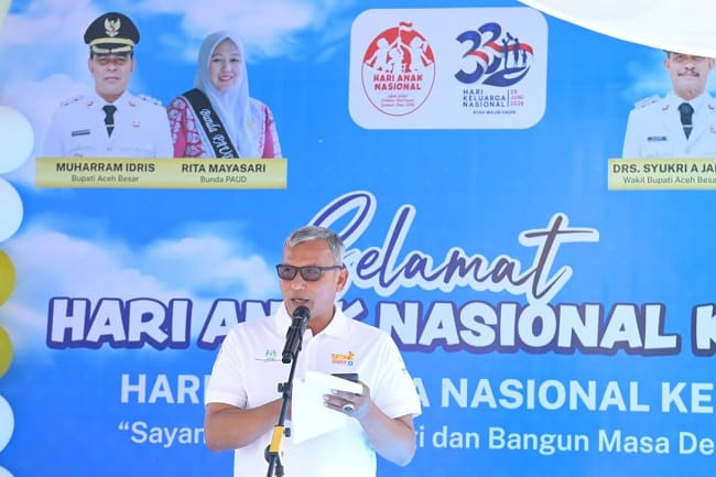 Kepala BPKD Aceh Besar Arifin SHI MSi, menyampaikan sambutannya pada pelaksanaan Gerakan Nasional Cerdas Keuangan (GENCARKAN), di Aula BPMP Aceh, Gampong Niron, Kecamatan Sukamakmur, Aceh Besar, Kamis (23/7/2026). FOTO/ MC ACEH BESAR