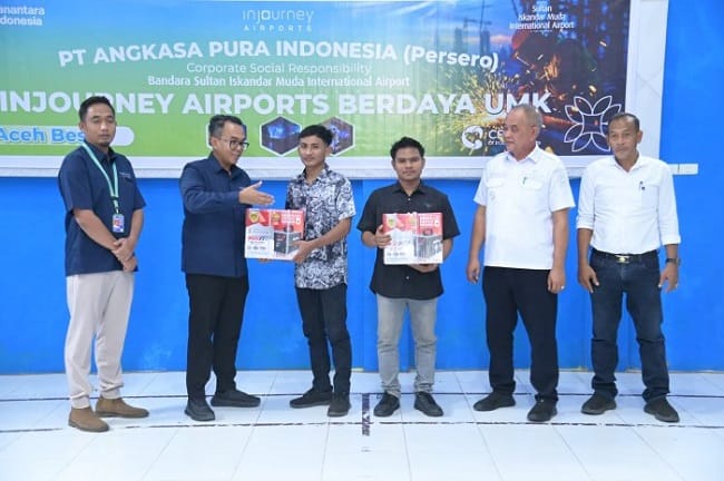 General Manager PT Angkasa Pura I (Persero), Rahmat Adil Indrawan sampaikan sambutan sekaligus membuka Pelaksanaan Program Injourney Airports Berdaya UMKM di Aula Gedung Serbaguna, Kecamatan Blang Bintang, Aceh Besar, Rabu (5/08/2026). FOTO/MC ACEH BESAR